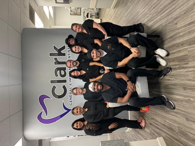 the dental care team at Clark General & Implant Dentistry
